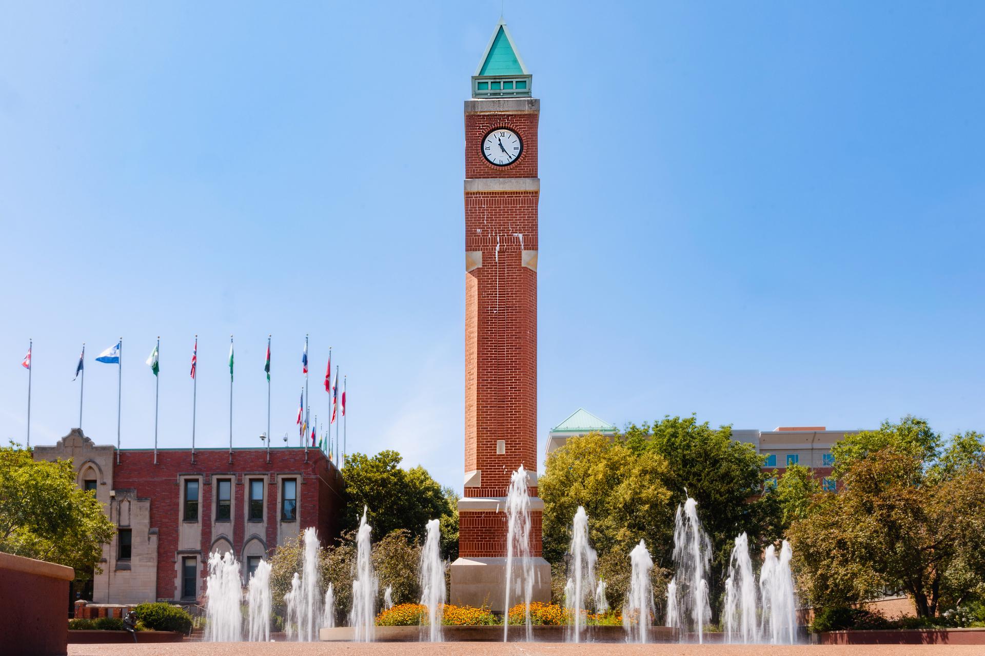 SLU's clock tower on a bright, sunny day.