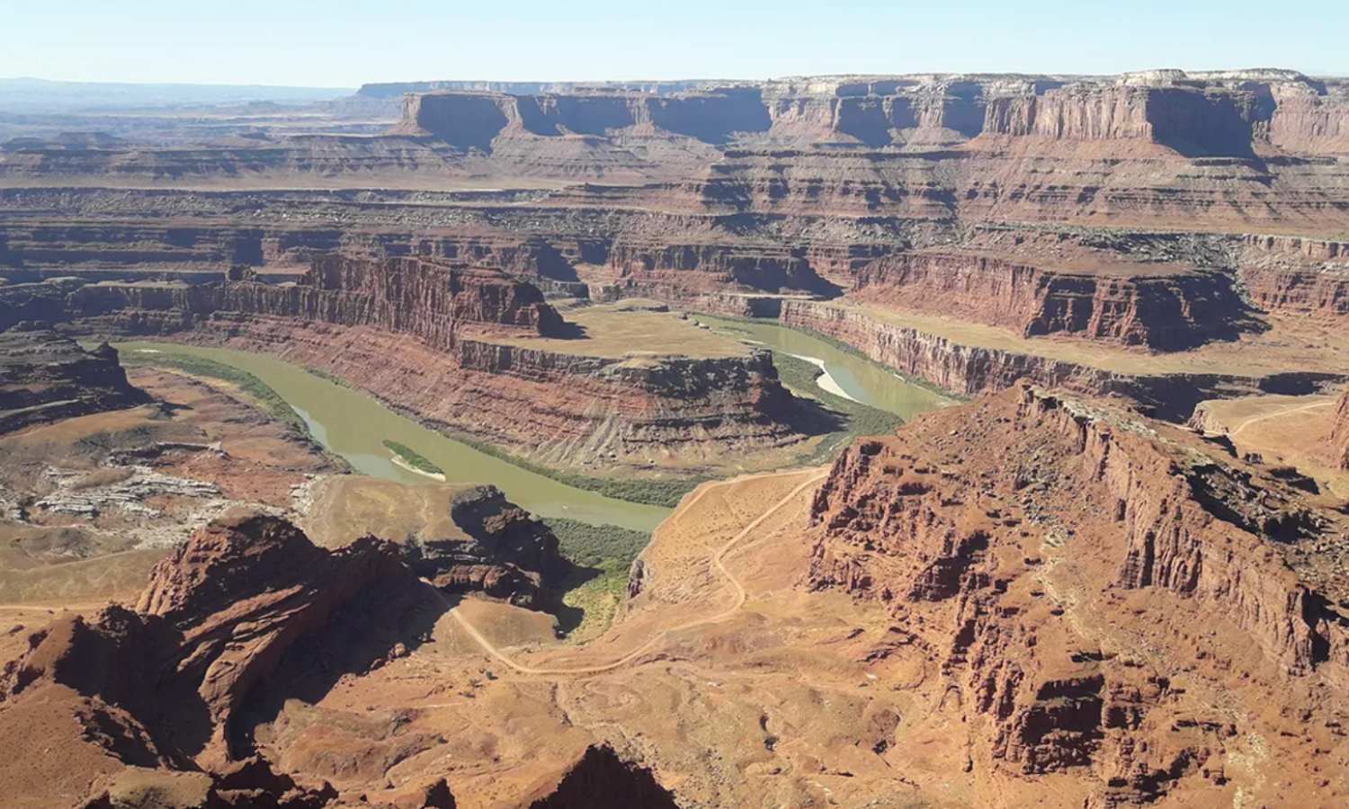 a river winding through a canyon 