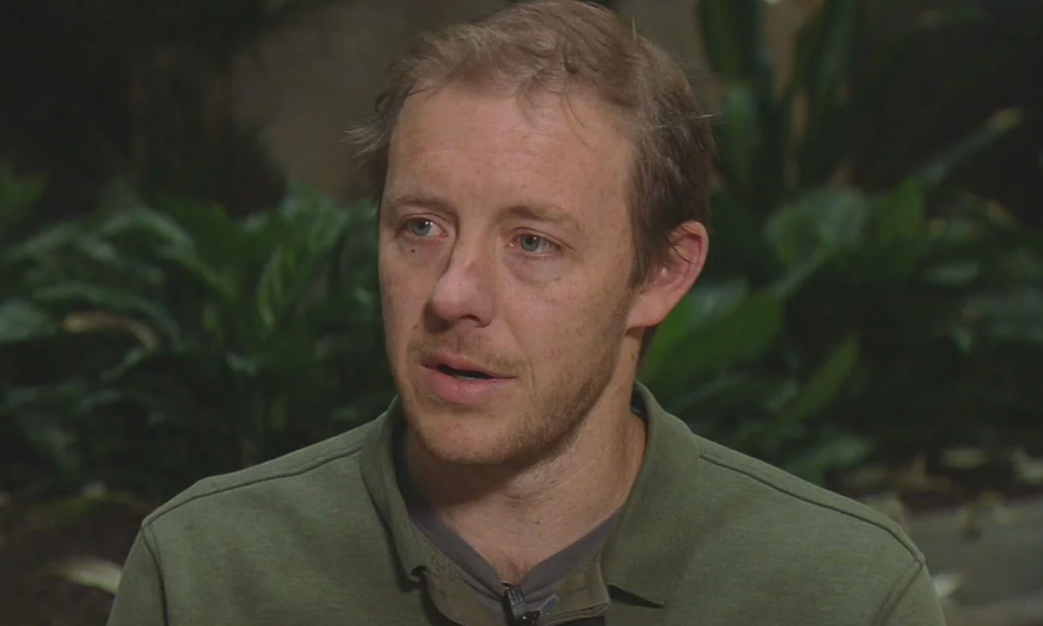 photo of Tony Vorster wearing a green shirt 