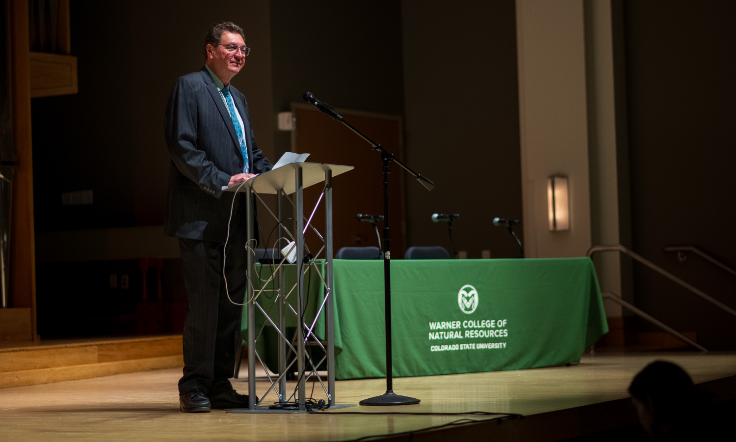 A. Alonso Aguirre speaks to a crowd