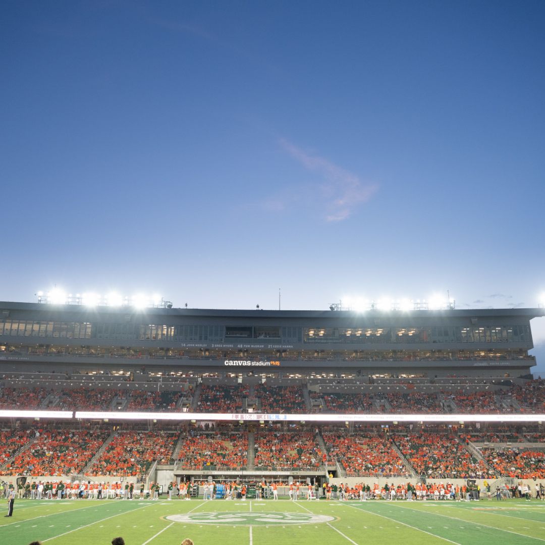 CSU's Canvas Stadium at dusk
