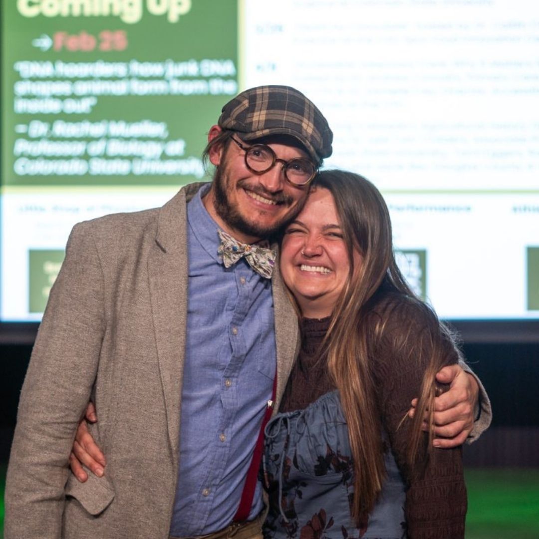 Tristan Kubik and Melissa Schreiner hug after their talk