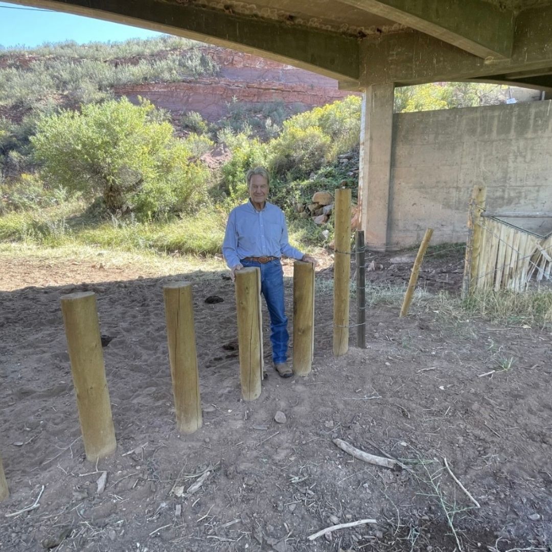 Rick Knight stands underneath a bridge